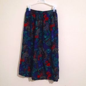 Ankle length, button adjustable, elastic, size 14 paisley skirt.